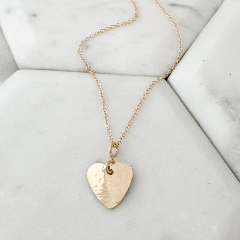 Heart texture oval necklace