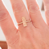 Twisted floral vertical ring