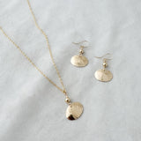 Dapped oval with bead necklace