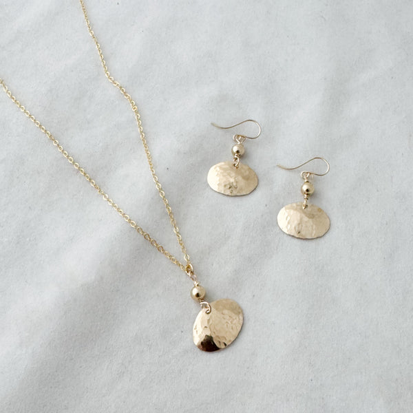 Dapped oval with bead necklace