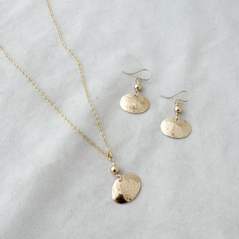 Dapped oval with bead necklace