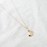 Dapped oval with bead necklace