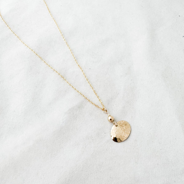 Dapped oval with bead necklace