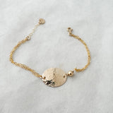 Oval with bead bracelet