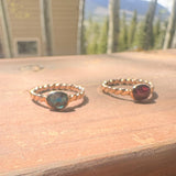Blue oval ring with twisted band