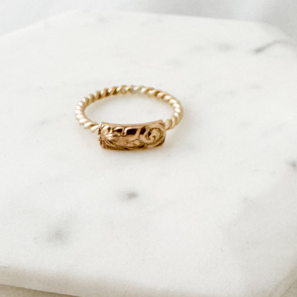 Twisted floral horizontal ring