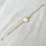 Oval with bead bracelet