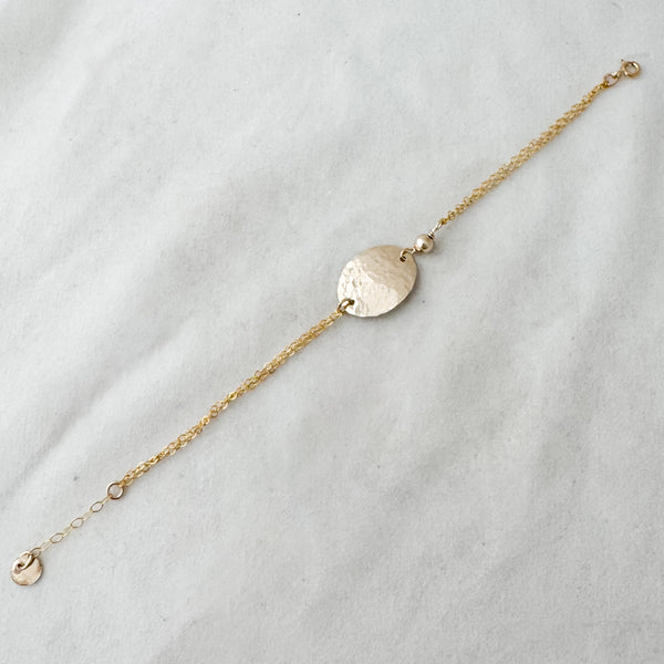 Oval with bead bracelet