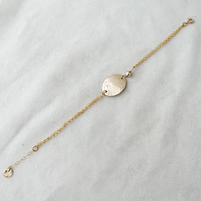 Oval with bead bracelet