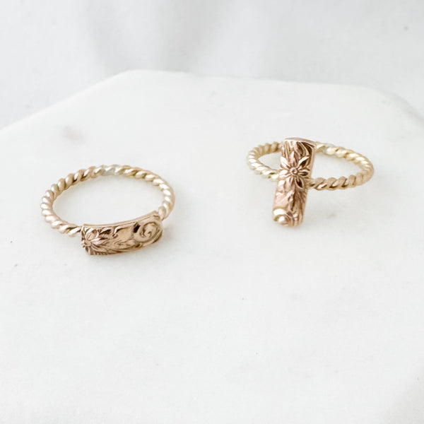 Twisted floral vertical ring