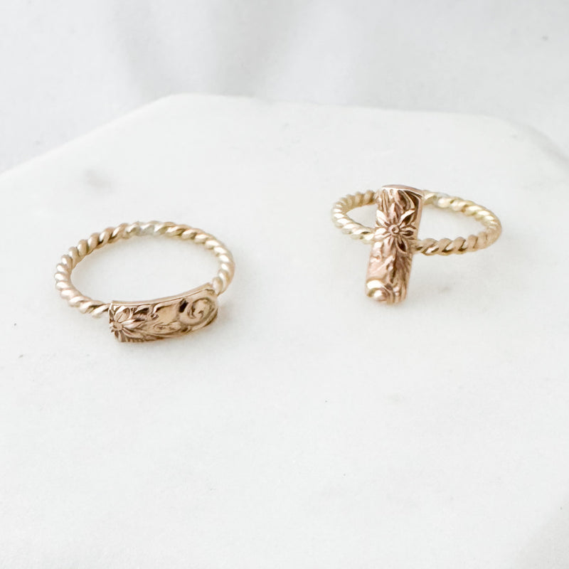 Twisted floral vertical ring